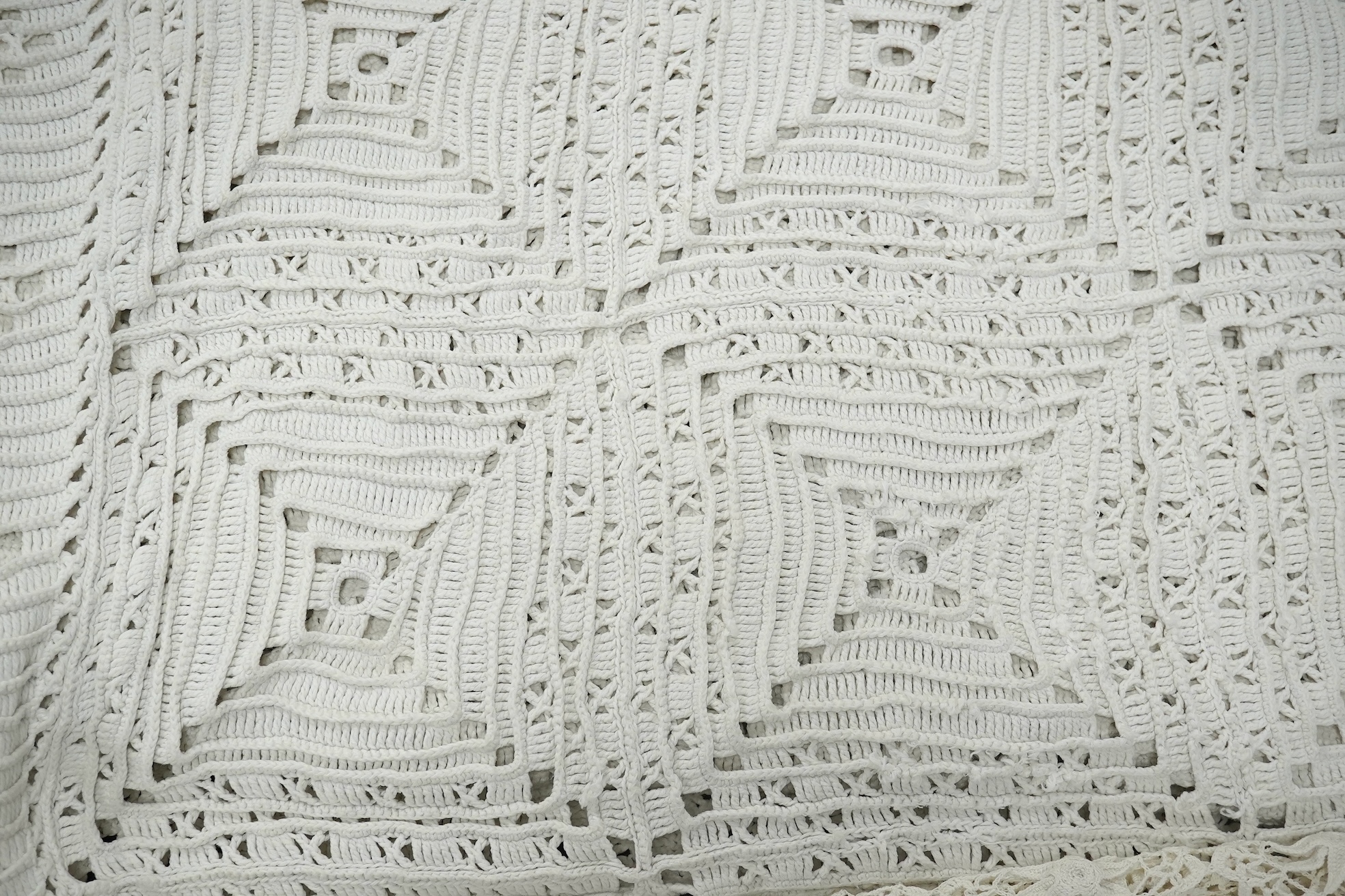 Three Edwardian thick white crochet bed covers, one made from squares with raised crochet flowers to the centres, another cover plainer and the other with loose crochet. 212cm x 166cm. Condition - all appear in good cond